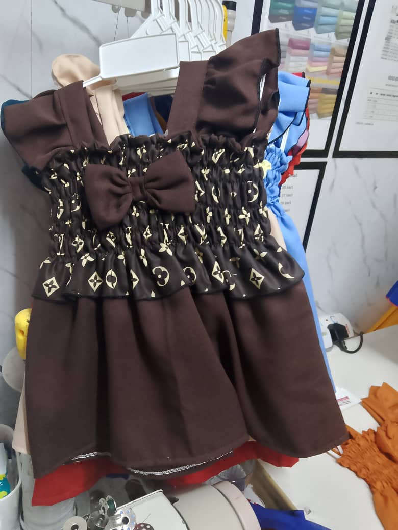 BAJU KANAK
